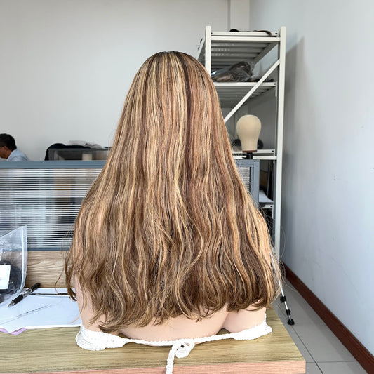 A natural warm brown with golden blonde highlights silk top wig